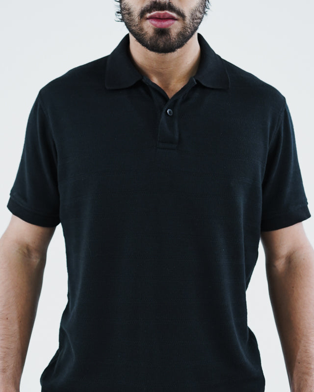 Camiseta polo manga corta negro texturizada