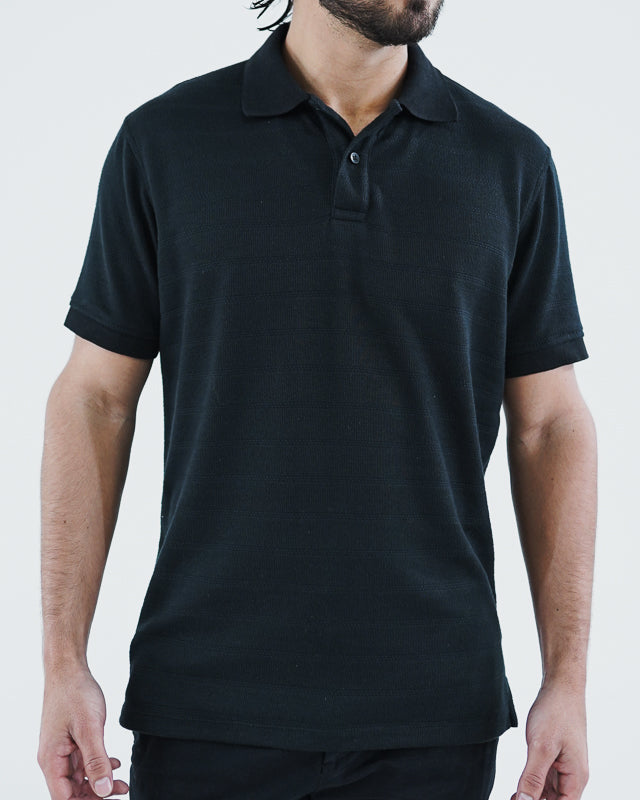 Camiseta polo manga corta negro texturizada